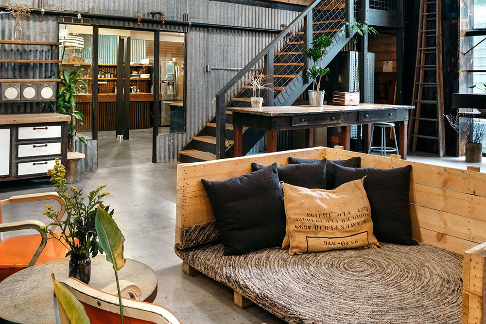 sofa and stairs at a coworking office